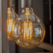 Filament LED žiarovka 84-67 Ø12,5cm Amber glass Filament LED žiarovka 84-67 Ø12,5cm Amber glass